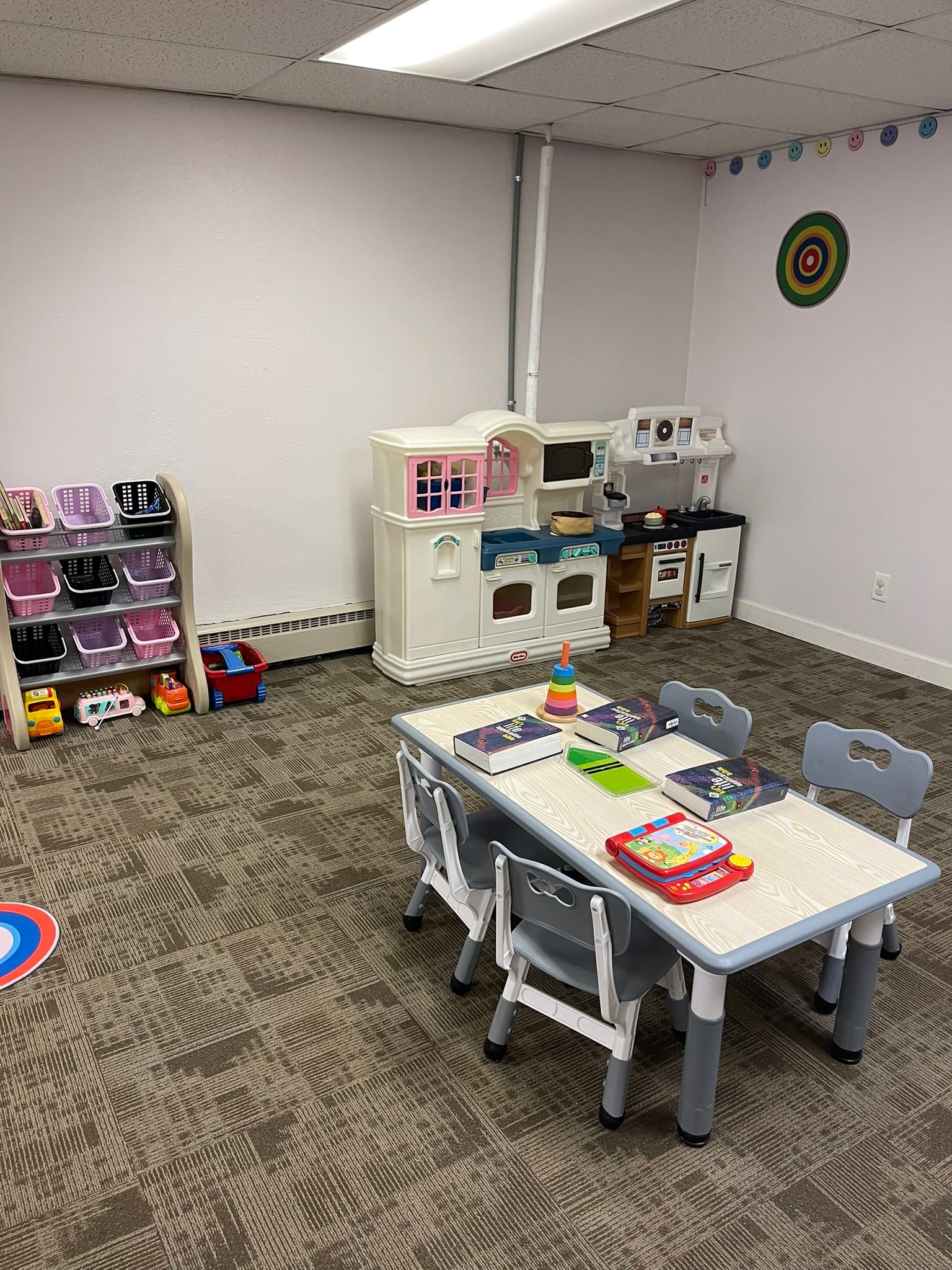 Classroom with a play kitchen at Futures Learning Center